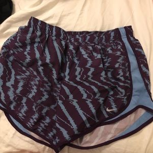 purple and blue nike shorts